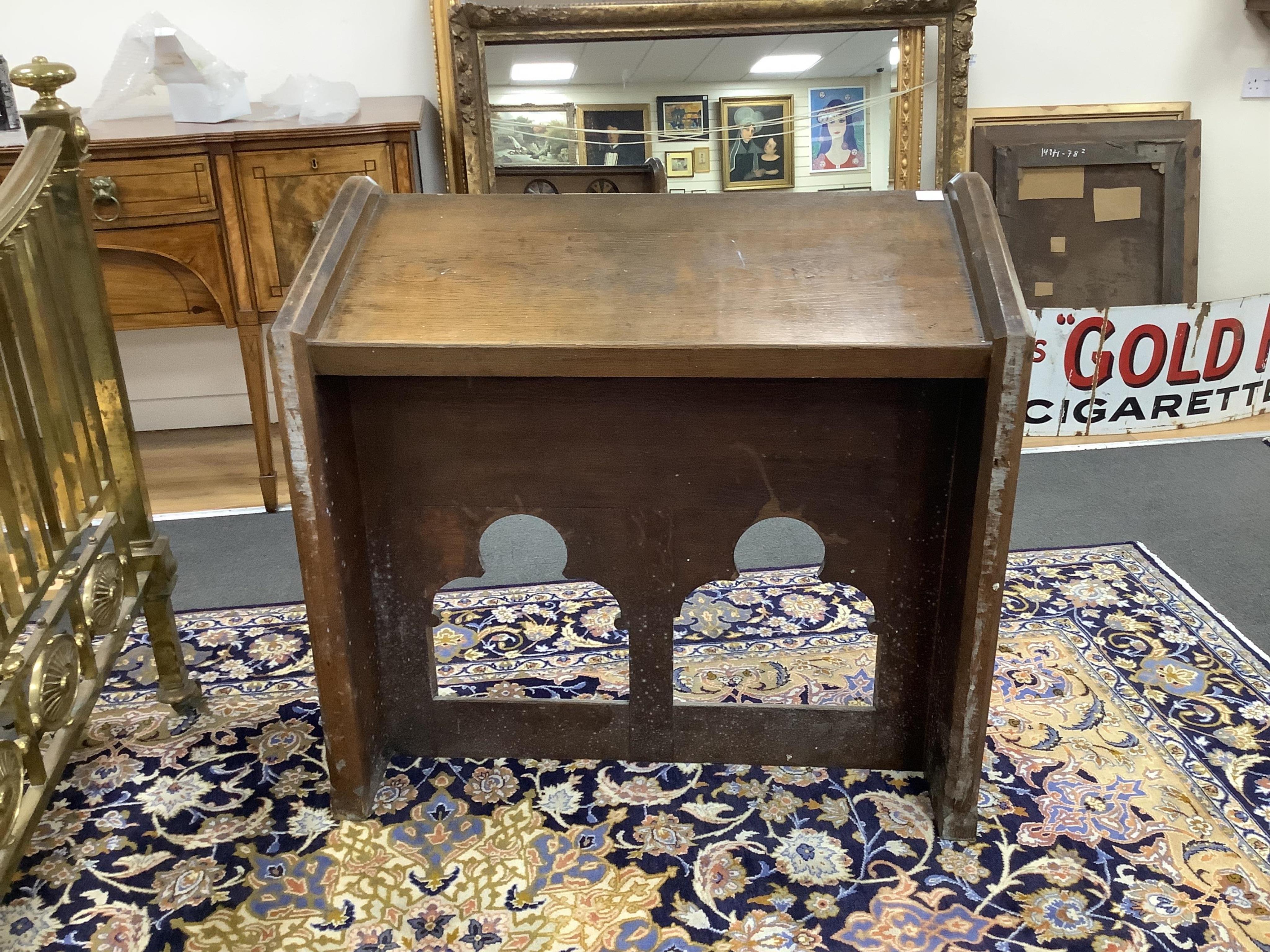 A Victorian Gothic revival lectern, width 102cm, depth 50cm, height 96cm. Condition - fair